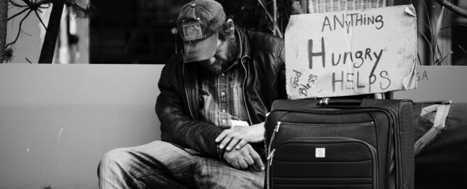 Corporal works of mercy homeless man looking for food