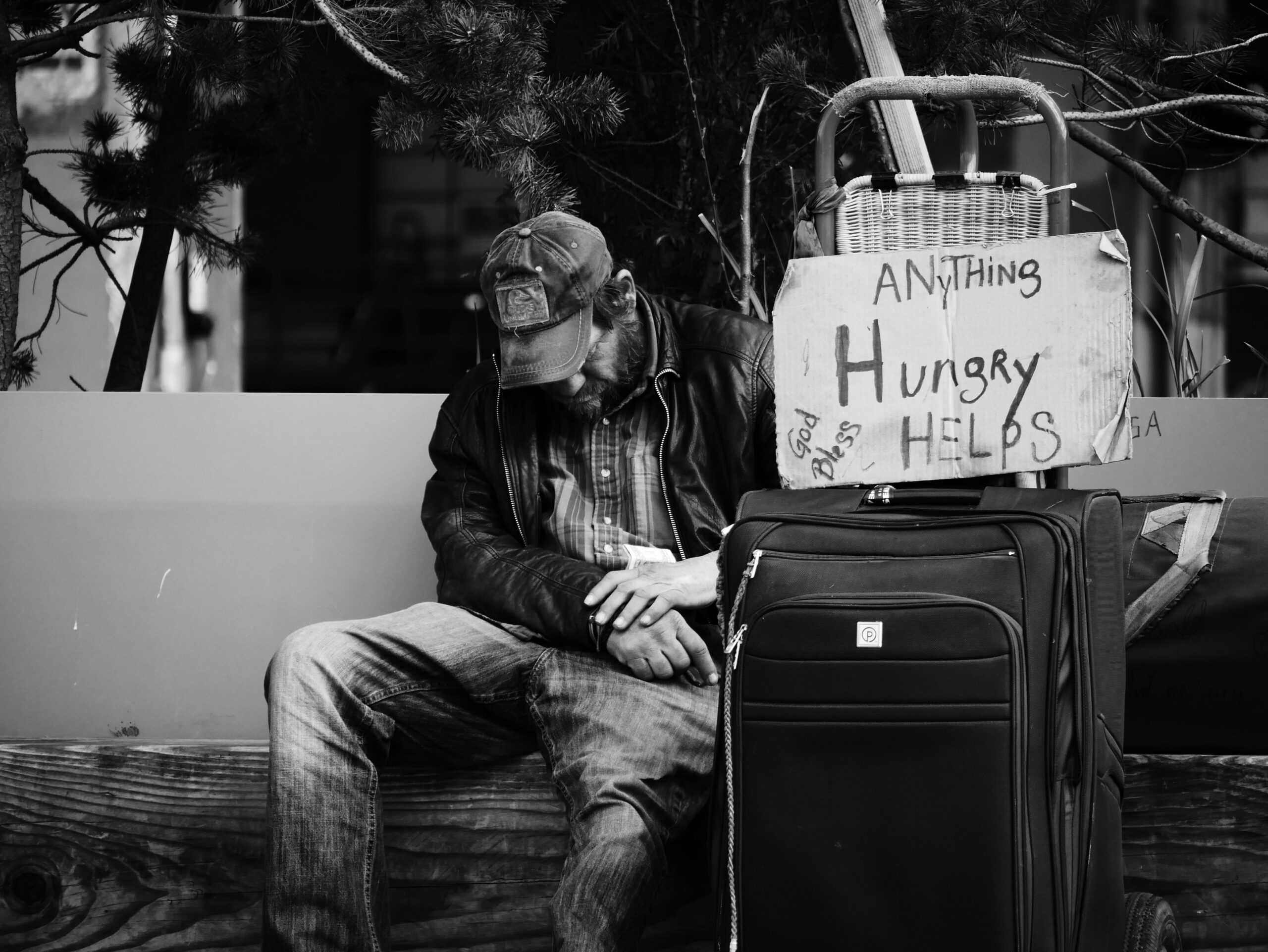 Corporal works of mercy homeless man looking for food